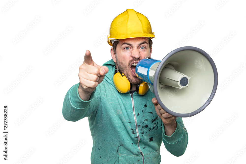 the construction worker holds a megaphone in his hands, the concept of issuing orders the construction worker holds a megaphone in his hands, the concept of issuing orders