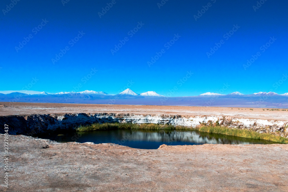 Obraz premium Salt Flat Lagoon Ojos del Salar in Atacama desert near San Pedro de Atacama, Antofagasta Region, Chile