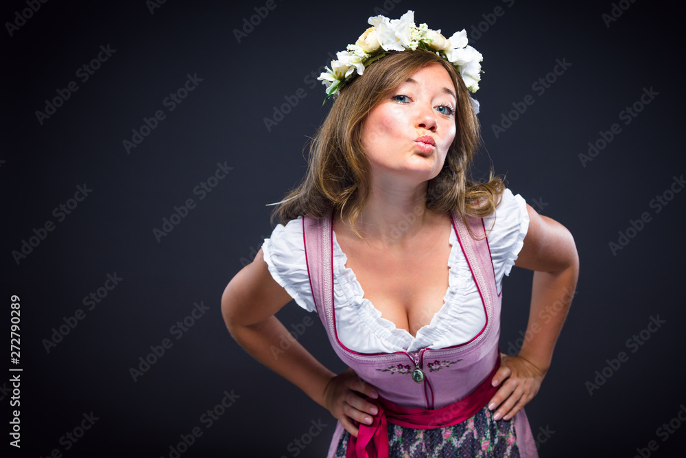 Fototapeta premium Beautiful woman in a traditional bavarian dirndl