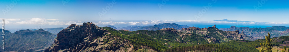 Colorful and scenic panorama View Of Roque Nublo And El Teide - Tejeda, Gran Canaria, Canary Islands, Spain