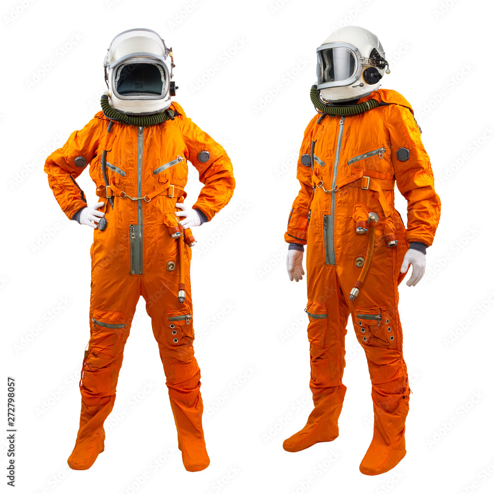 Fototapeta premium Set of two cosmonauts isolated on a white background. Astronauts wearing space suits with helmets on white background