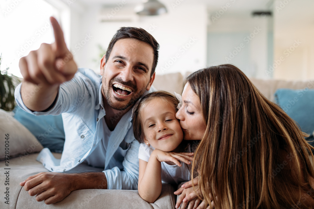 Happy family having fun time at home Happy family having fun time at home
