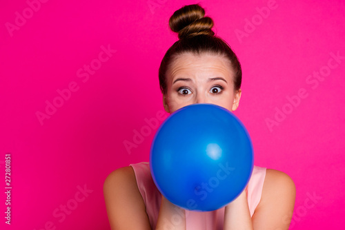 Close up photo of nice pretty lovely millennial inflate ballon have free time positive cheerful funny funky student wear fashionable modern clothes isolated bright colorful background © deagreez