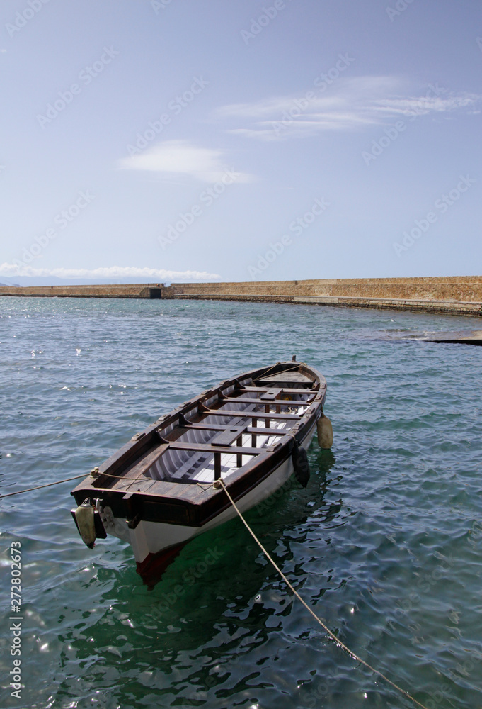 Small boat in the port of Chania, Crete