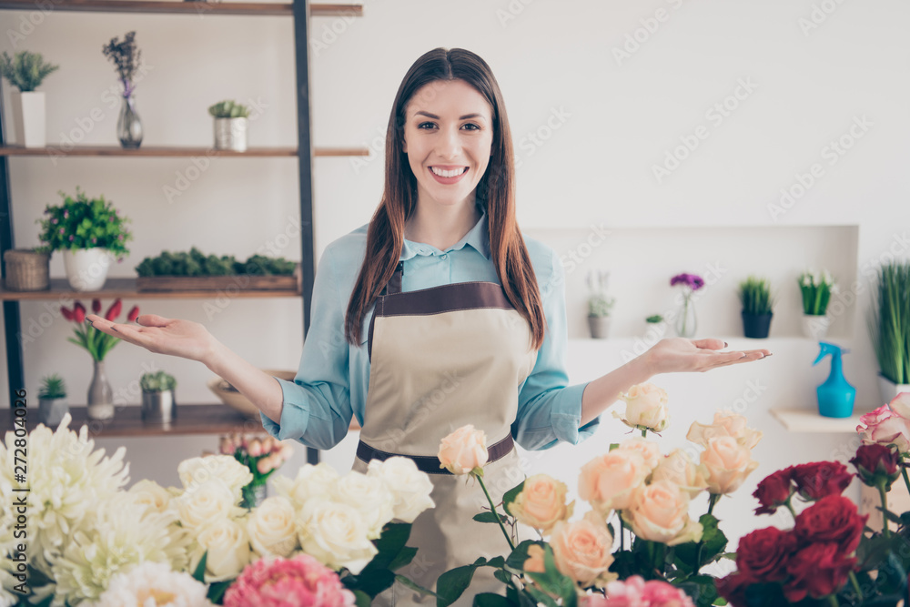 Portrait of positive cheerful lovely sweet lady cute charming people millennial feel content have sales retail orangery wear blue stylish trendy blue shirt beautiful outfit
