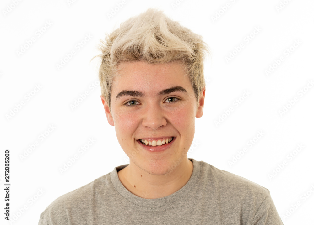 Portrait of attractive cheerful transgender young man with smiling happy face. Human expressions and emotions Portrait of attractive cheerful transgender young man with smiling happy face. Human expressions and emotions