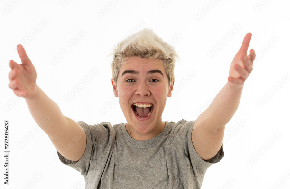 Portrait of a happy young teenager boy welcoming with open arms and happiness Portrait of a happy young teenager boy welcoming with open arms and happiness