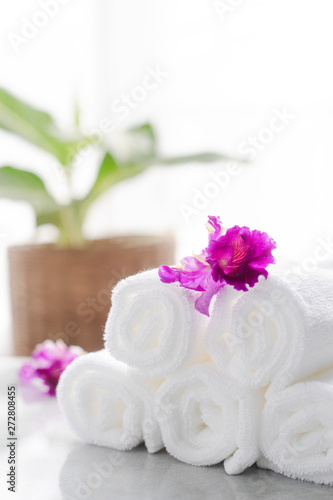Towels on table with copy space blurred bathroom background. For product display montage.