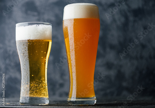 Obraz na plátně Two Beers on the table. Wheat unfiltered beer and lager