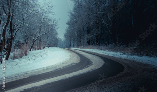 Winter Russian asphalt road. Winter road. Snowy road. Journey .