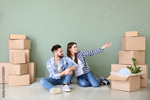 Young couple with belonging...