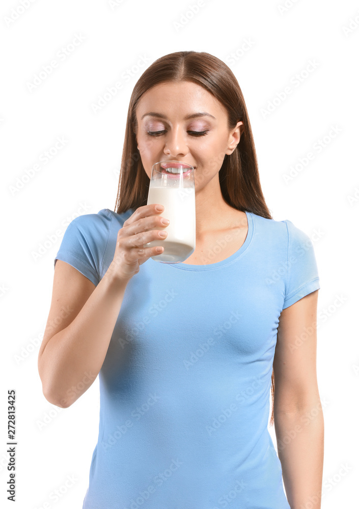Beautiful woman drinking tasty milk on white background Beautiful woman drinking tasty milk on white background