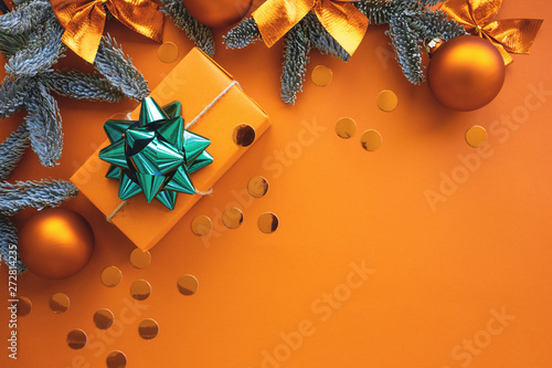 Christmas composition.  Background with gift box and decorations. 