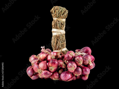 The fresh shallot on the black bagkground with clipping path photo