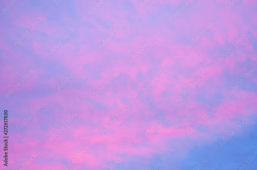 Beautiful pink sky. Cloud background with a pastel colour.
