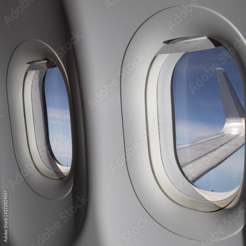 view of the windows of an airplane in flight