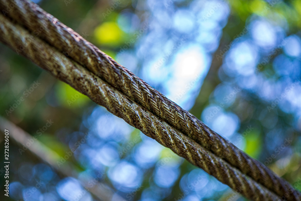 metal chain and wire rope holding bridge in place metal chain and wire rope holding bridge in place