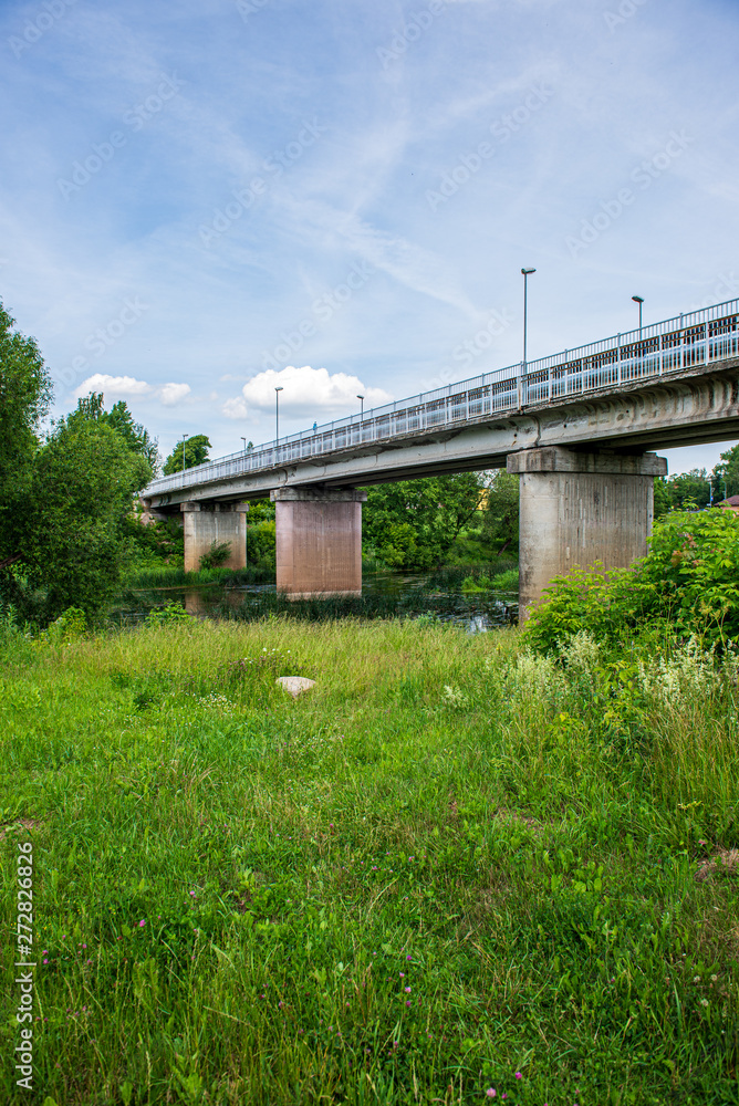 concrete brick bridge over the river