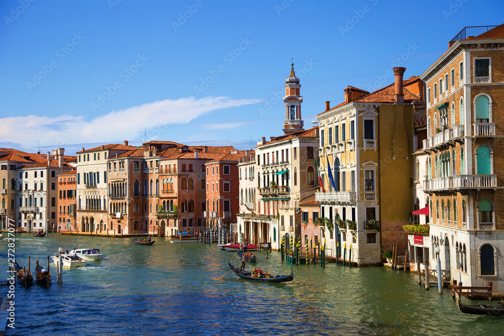 Evening view of the Grand Canal with gondolas and boats. Venice, Italy.