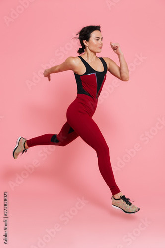 Full length portrait of a fit beautiful sports woman