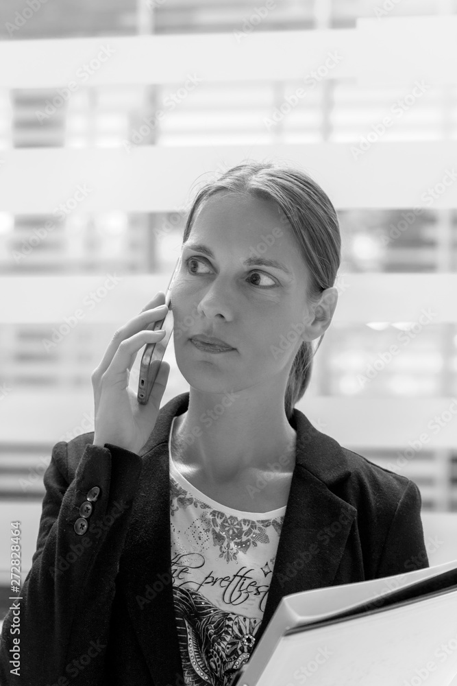 Fototapeta premium business woman with mobile phone