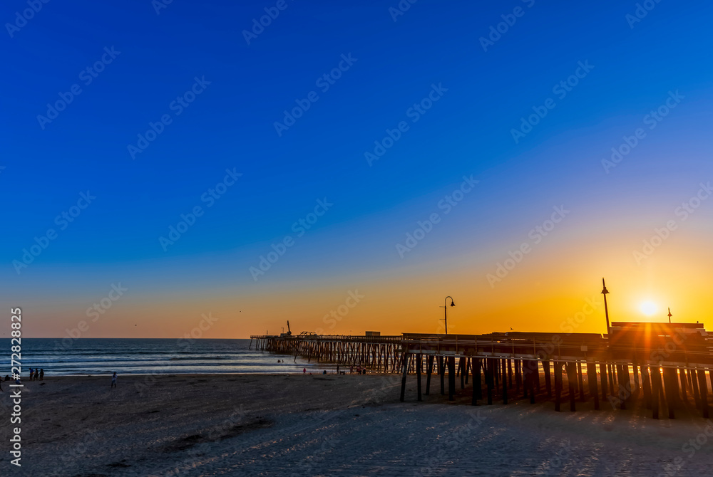 Sunset at the Beach over the Pier Sunset at the Beach over the Pier