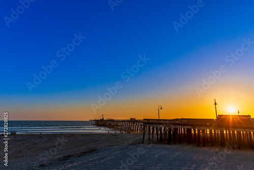 Sunset at the Beach over the Pier