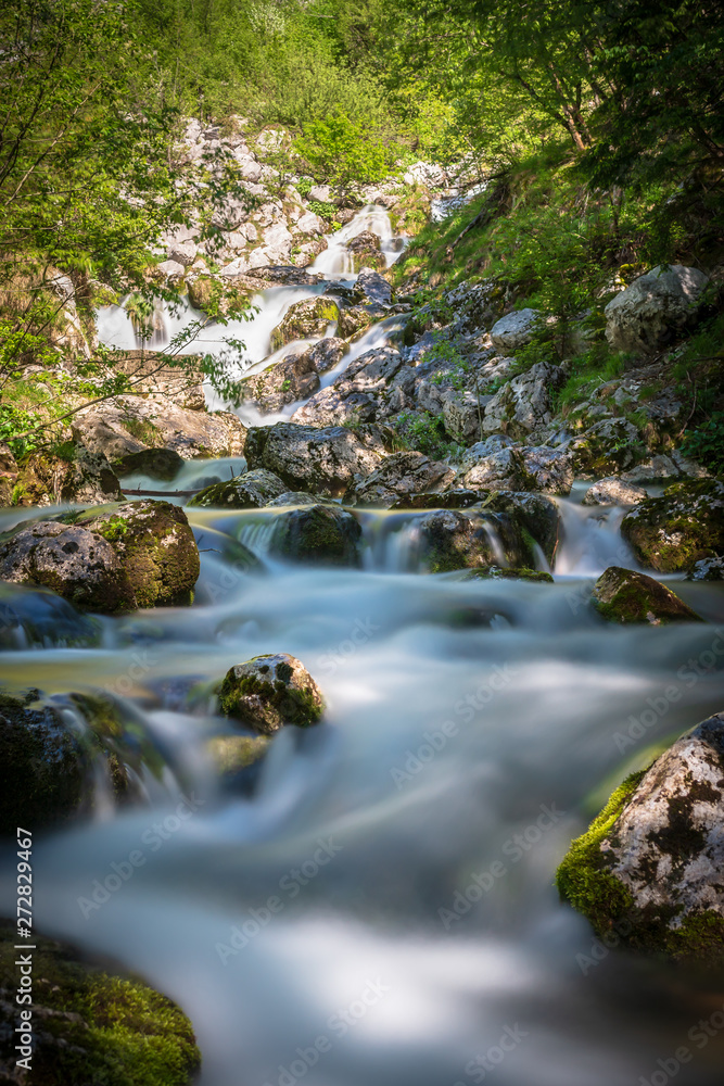 Soca river near its spring at the Soca Valley in Slovenia Soca river near its spring at the Soca Valley in Slovenia