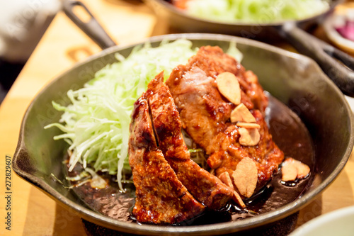 Tokyo Tonteki is one of the popular food at Shibuya area. Tonteki means pork loin steak, the pork is juicy and its grilled in a frying pan with their original sauce. photo