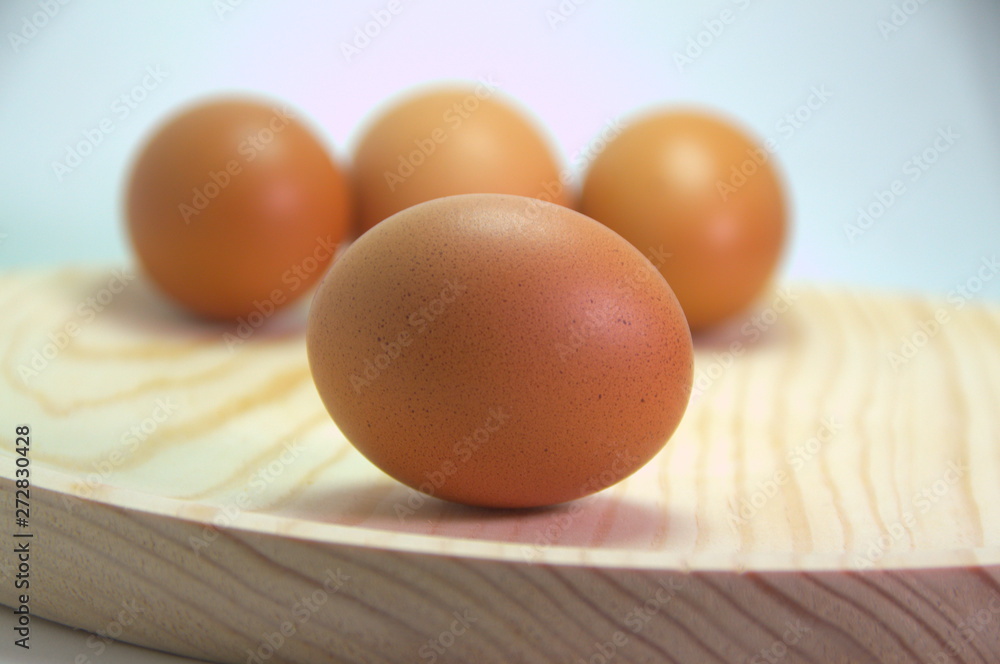 brown eggs on wooden table brown eggs on wooden table