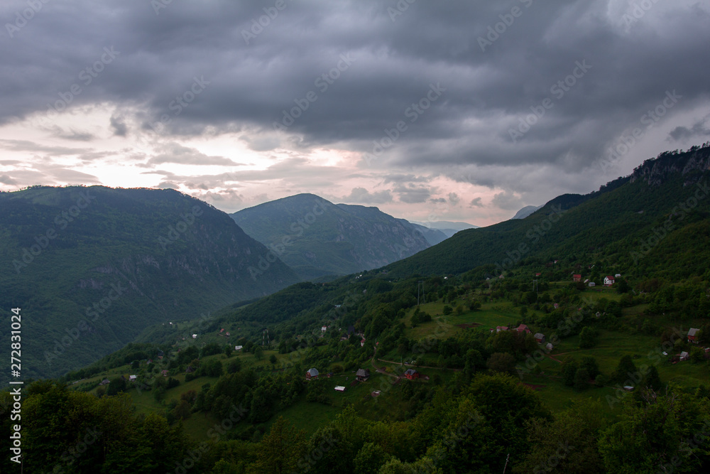 Fototapeta premium Sunset Over Mountain Village