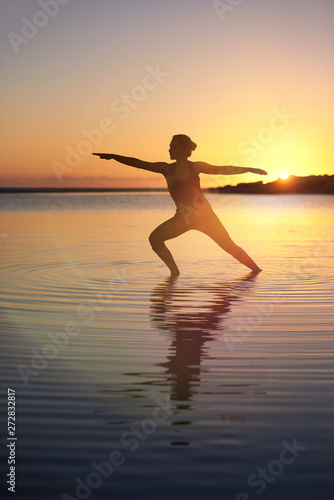Yoga woman sunrise