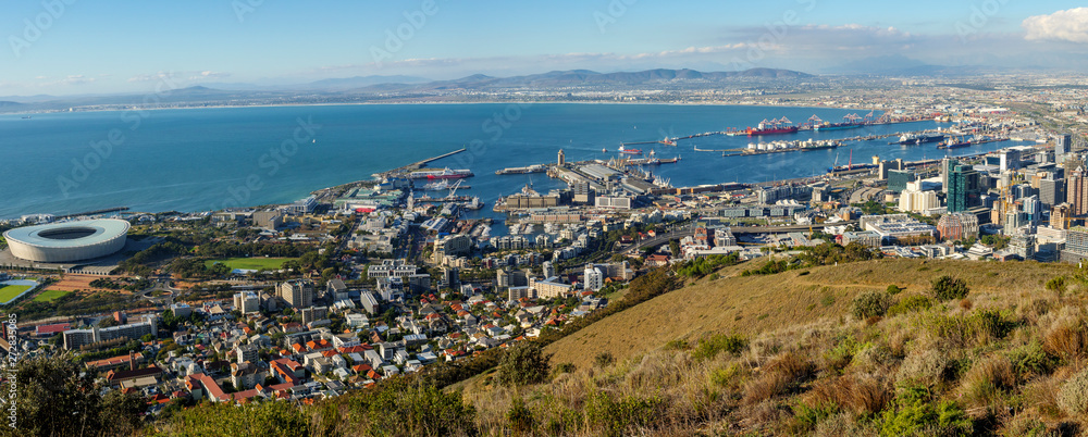 Amazing panoramic view of beautiful Cape Town from the slopes of Signal Hill showing V&A waterfront, harbour and soccer stadium. Western Cape. South Africa