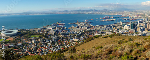 Amazing panoramic view of beautiful Cape Town from the slopes of Signal Hill showing V&A waterfront, harbour and soccer stadium. Western Cape. South Africa