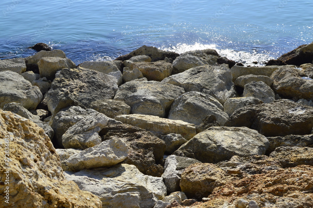 Rocky coastline with a bright turquoise color of the Mediterranean Sea in Spain