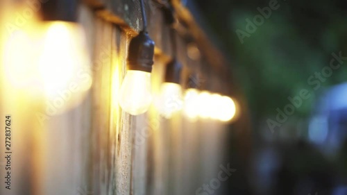 Stringed Lights On Fence Outdoor Cookout Backyard