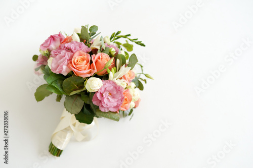 wedding bouquet with flowers roses on a white background with copy space. minimal concept. mockup © Nastya