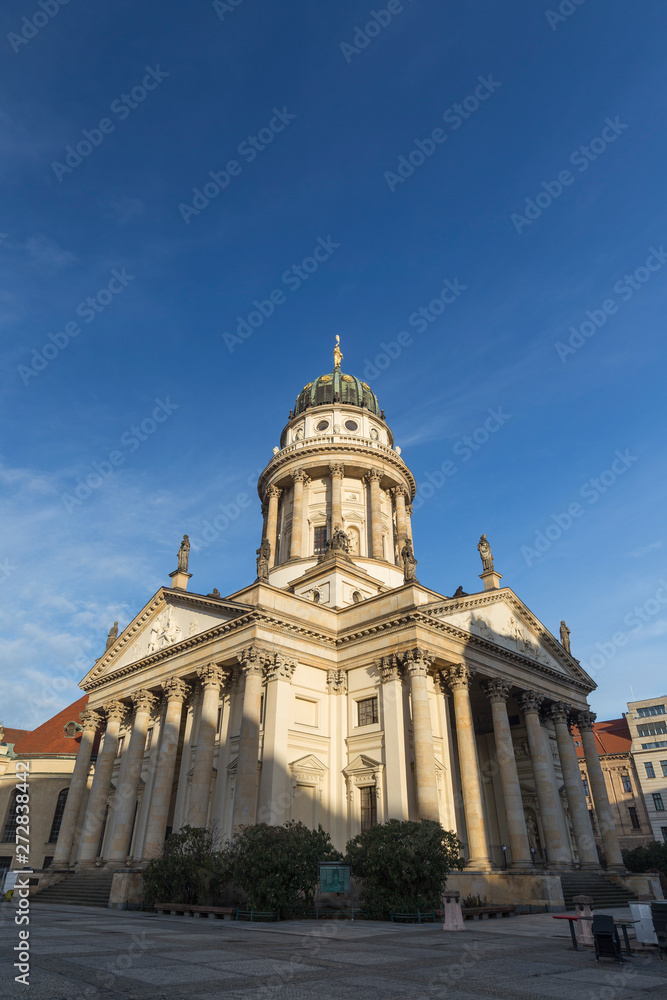 Beautiful view of the Französischer Dom (French Cathedral) at the Gendarmenmarkt Square in Berlin, Germany, on a sunny morning. Copy space.