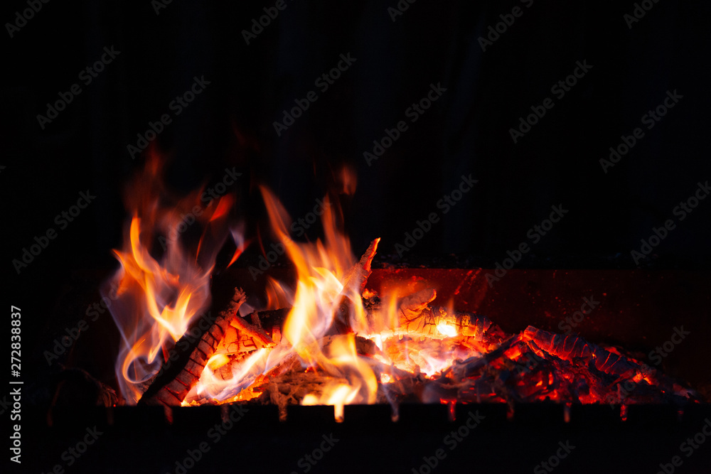 Fire bonfire. The flame of fire burns in an open furnace at night. Fire bonfire. The flame of fire burns in an open furnace at night.