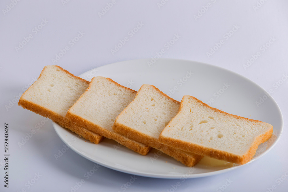 breads in white plate 