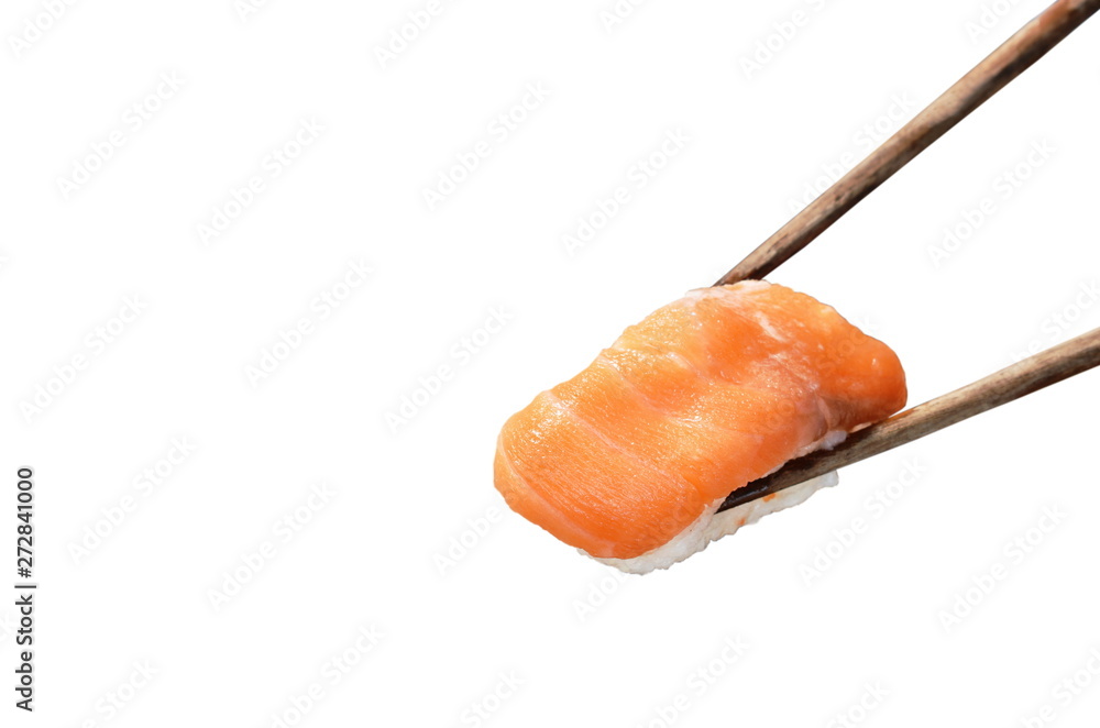 salmon Sushi Japanese food picking in wooden chopsticks salmon Sushi Japanese food picking in wooden chopsticks