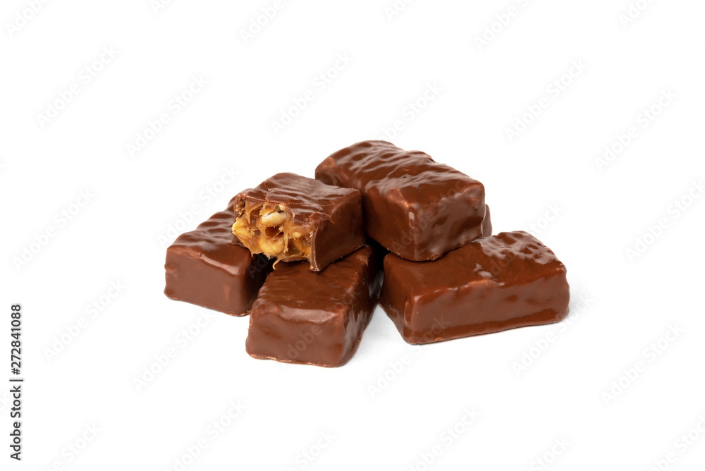 Chocolate sweet with caramel and peanut isolated on white background. Chocolate sweet with caramel and peanut isolated on white background.