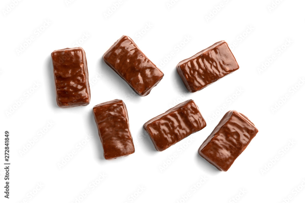 Chocolate sweet with caramel and peanut isolated on white background. Chocolate sweet with caramel and peanut isolated on white background.