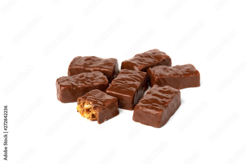 Chocolate sweet with caramel and peanut isolated on white background. Chocolate sweet with caramel and peanut isolated on white background.