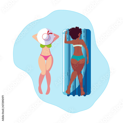 beautiful interracial girls with float mattress in water