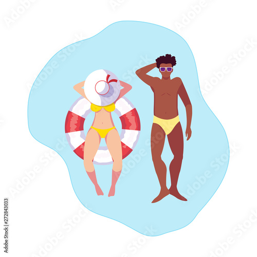 interracial couple with swimsuit and float in water © djvstock