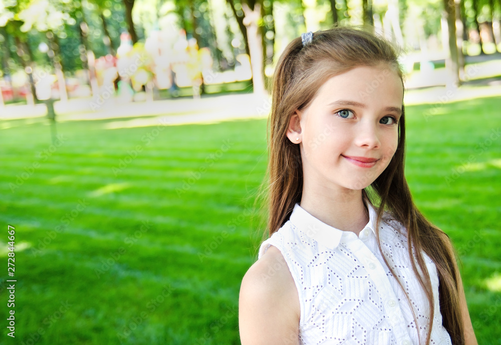 Portrait of adorable smiling little girl child schoolgirl teenager outdoors Portrait of adorable smiling little girl child schoolgirl teenager outdoors