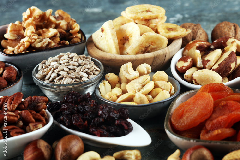 Composition with dried fruits and assorted healthy organic nuts Composition with dried fruits and assorted healthy organic nuts