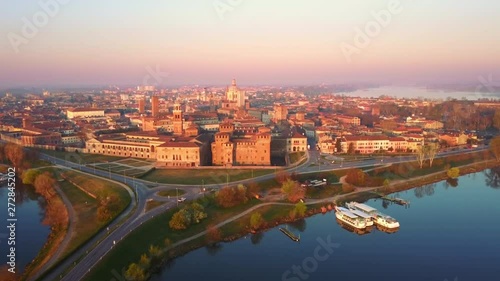 mantua skyline aerial shot drone fly forward to city center at dawn