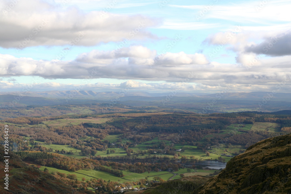 View from the side of Coniston Old Man looking east across the beautiful English Lake District National Park towards the Howgills in the Pennines in the far distance.